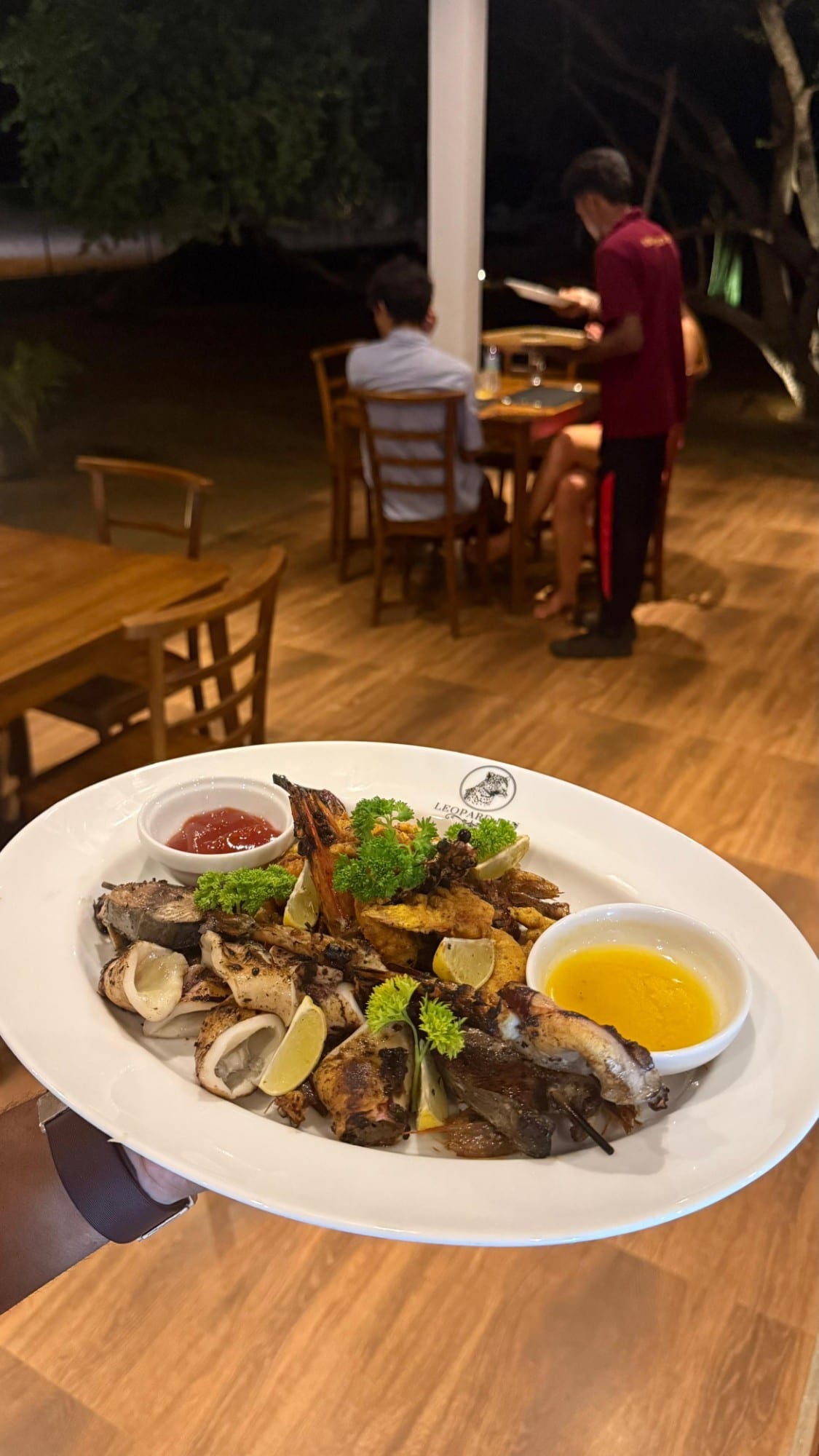 A grilled seafood platter with prawns, squid and fish at Leopard Inn Arugam Bay